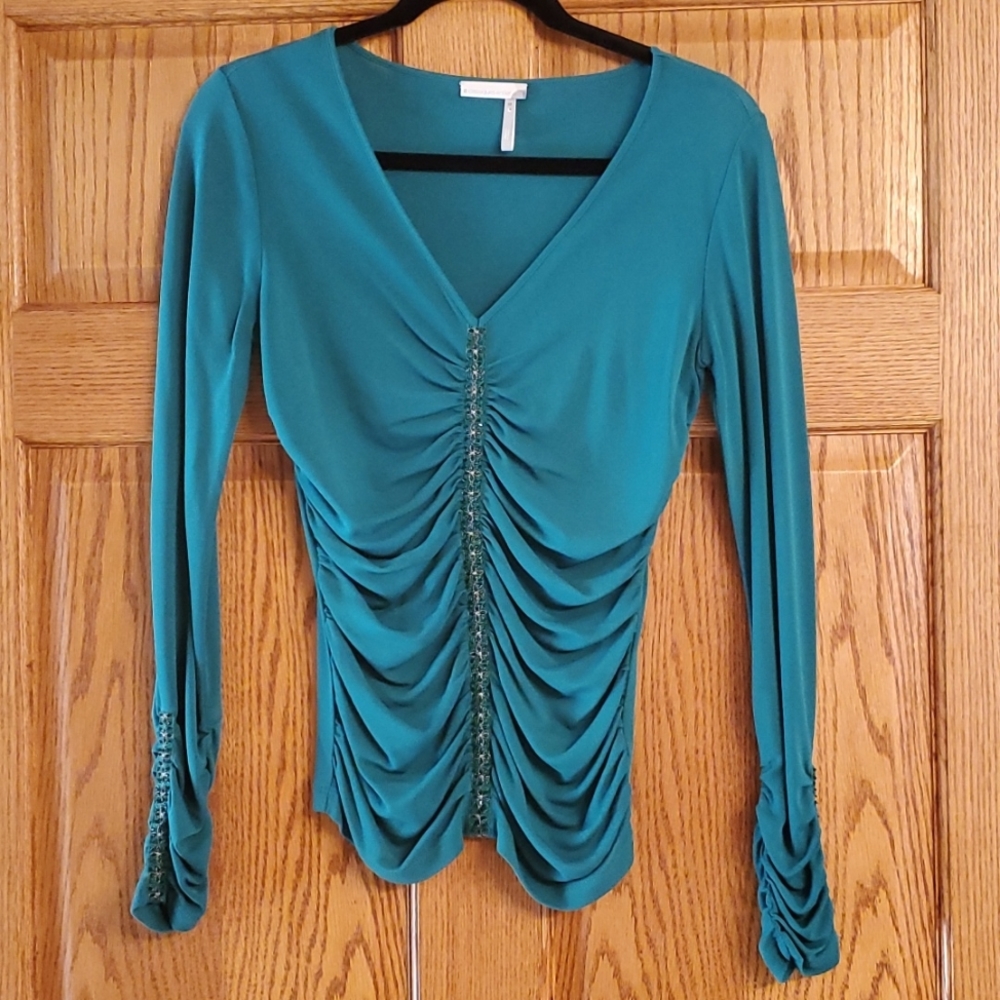 Beautiful green medium embellished top. Perfect for a holiday outing.